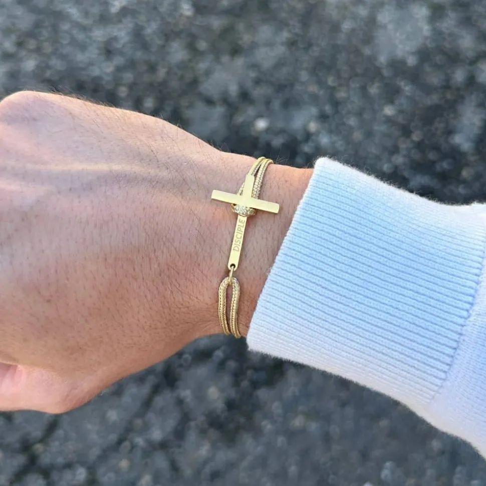 Bracelet croix dorée beige femme